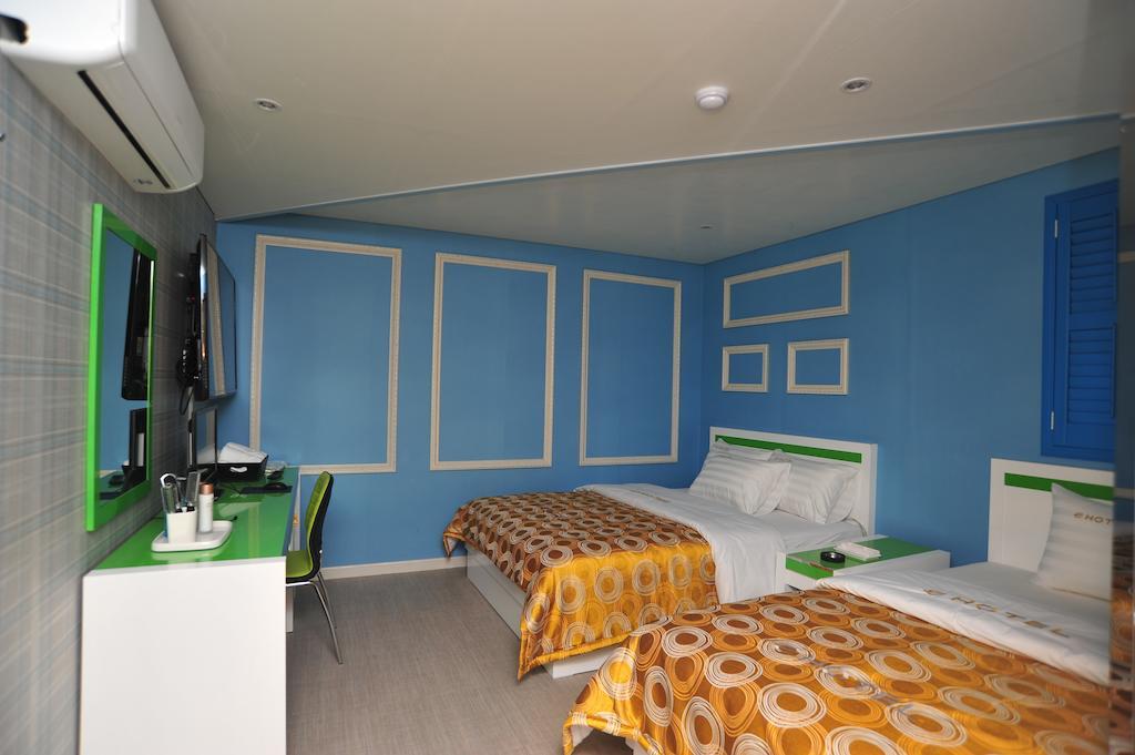 E Hotel Juan Inchon Rum bild