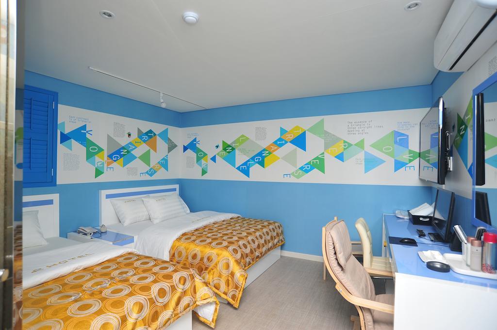E Hotel Juan Inchon Rum bild